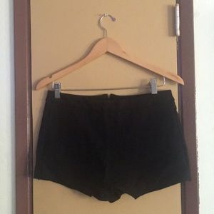 Black skort with zipper in the back.
